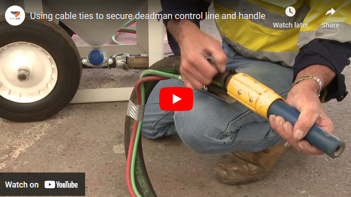 Using cable ties to secure deadman control line and handle